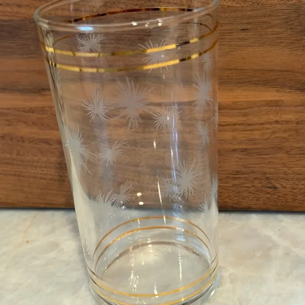Vintage gold and clear etched starburst highball glass